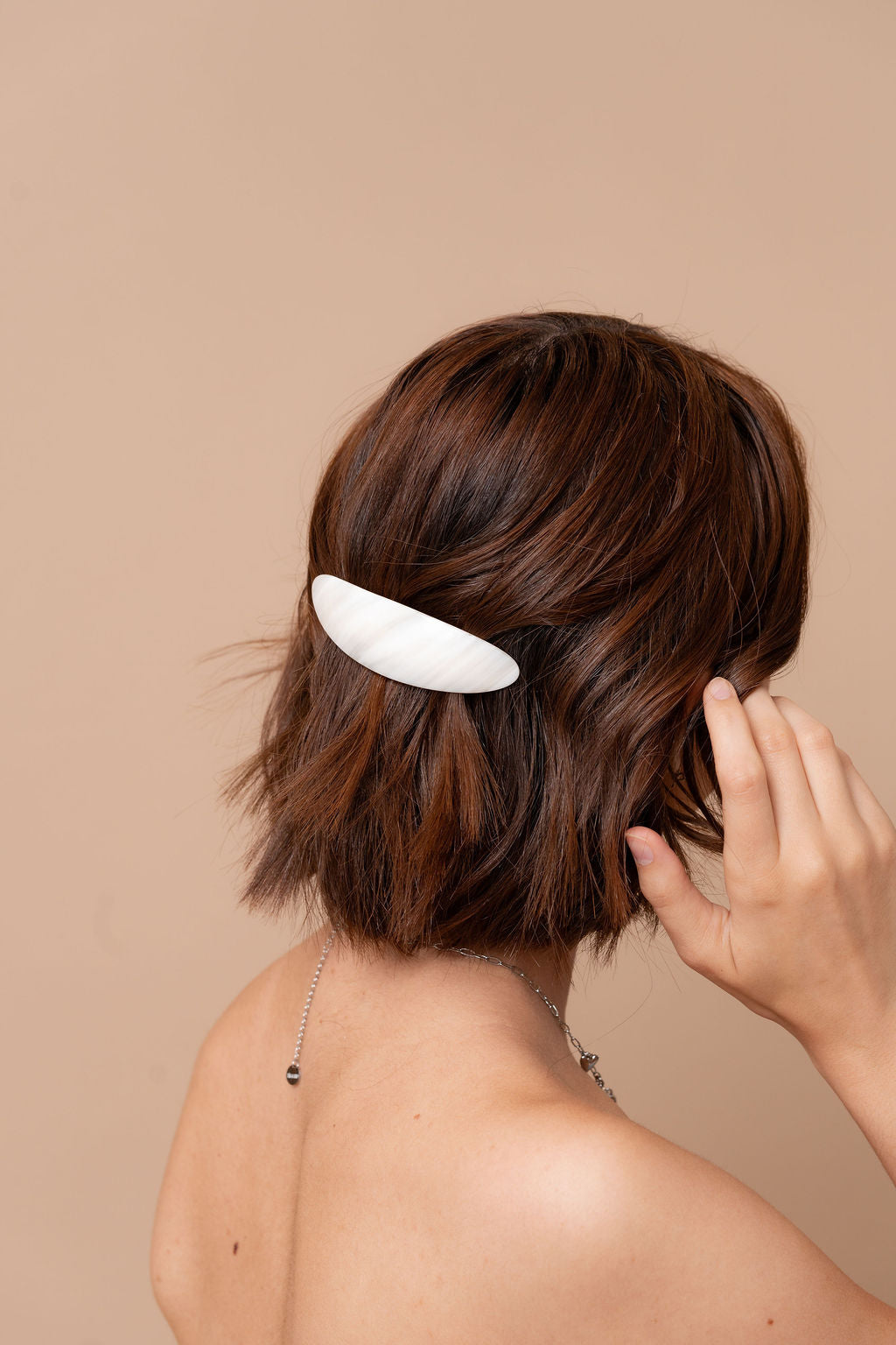 FREE ARCH BARRETTE