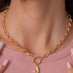 Model wearing the Bubble Letter monogram carabiner necklace by Tikkhu