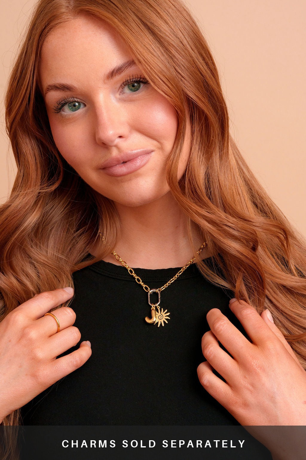 Roux Duo Carabiner Necklace on a model with charms. Charms sold separately
