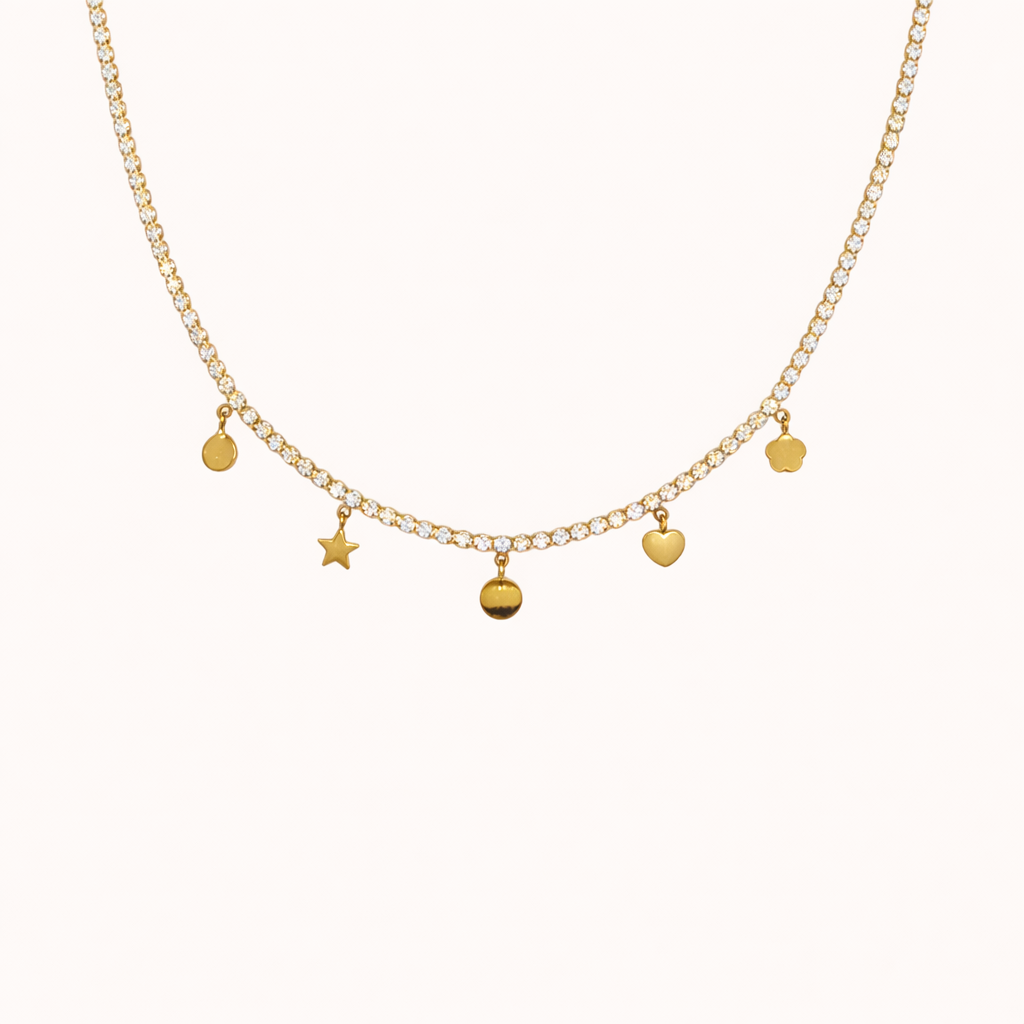 Gold tennis chain charm necklace by Tikkhu