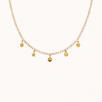 Gold tennis chain charm necklace by Tikkhu