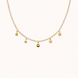 Gold tennis chain charm necklace by Tikkhu