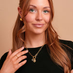 Model wearing the Indie gold filled carabiner necklace by Tikkhu