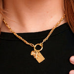 Lennon Carabiner Necklace on a model with charms. Charms sold separately