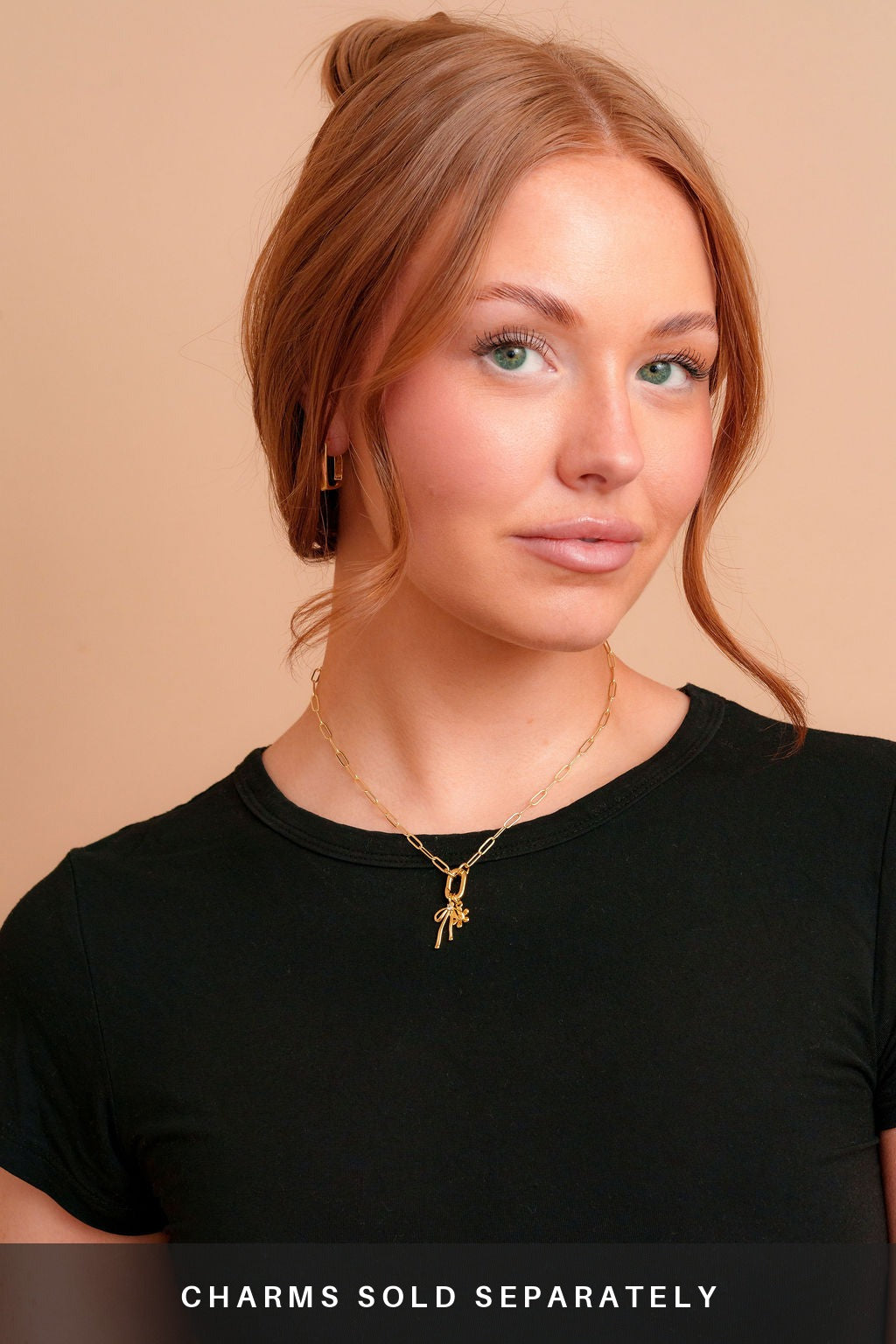 Marlow Mini Carabiner Necklace on a model with charms. Charms sold separately