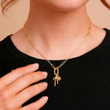 Marlow Mini Carabiner Necklace on a model with charms. Charms sold separately