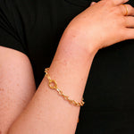 Model wearing the Raye Carabiner Bracelet by Tikkhu