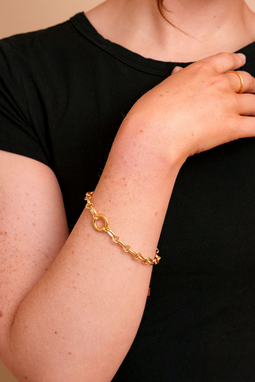Model wearing the Raye Carabiner Bracelet by Tikkhu