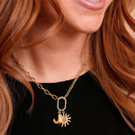 Roux Duo Carabiner Necklace on a model with charms. Charms sold separately